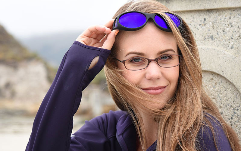 sunglasses worn over eyeglasses